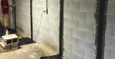 Basement restoration services available in the Greensboro area. We can waterproof your basement, getting it done on time and on budget.